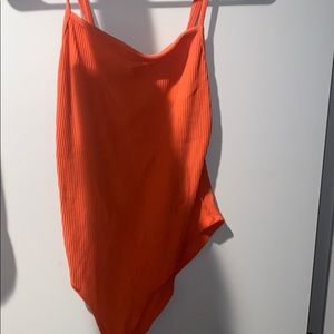 Orange body suit